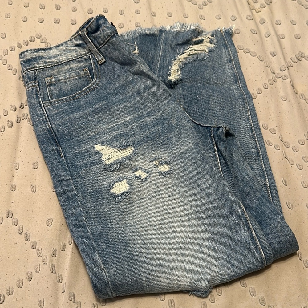 Distressed medium wash jeans